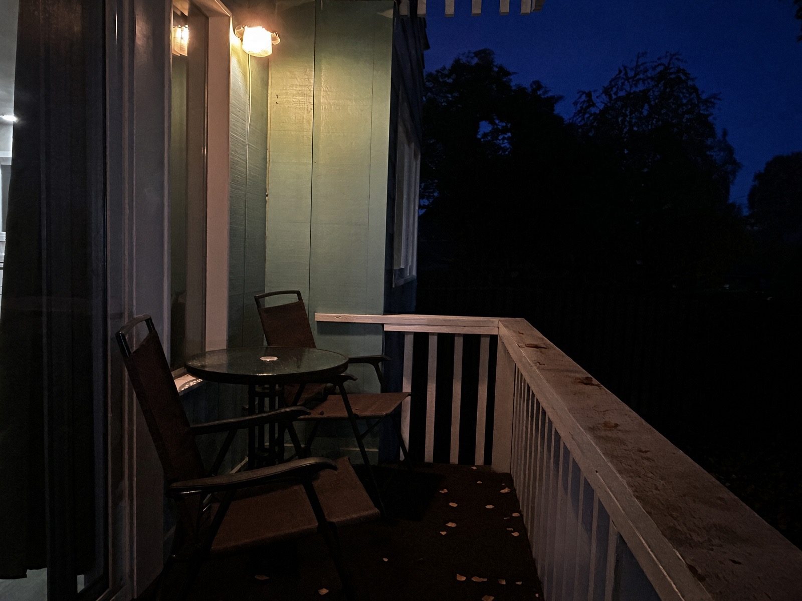 Private balcony with table and chairs
